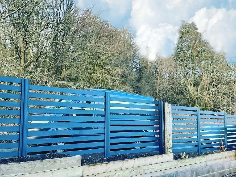 blue slat aluminium fence built in Townsville
